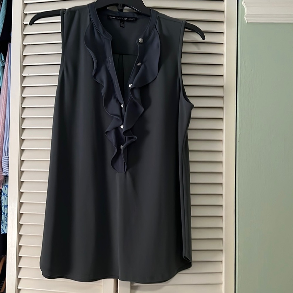 Sleeveless ruffle top.
